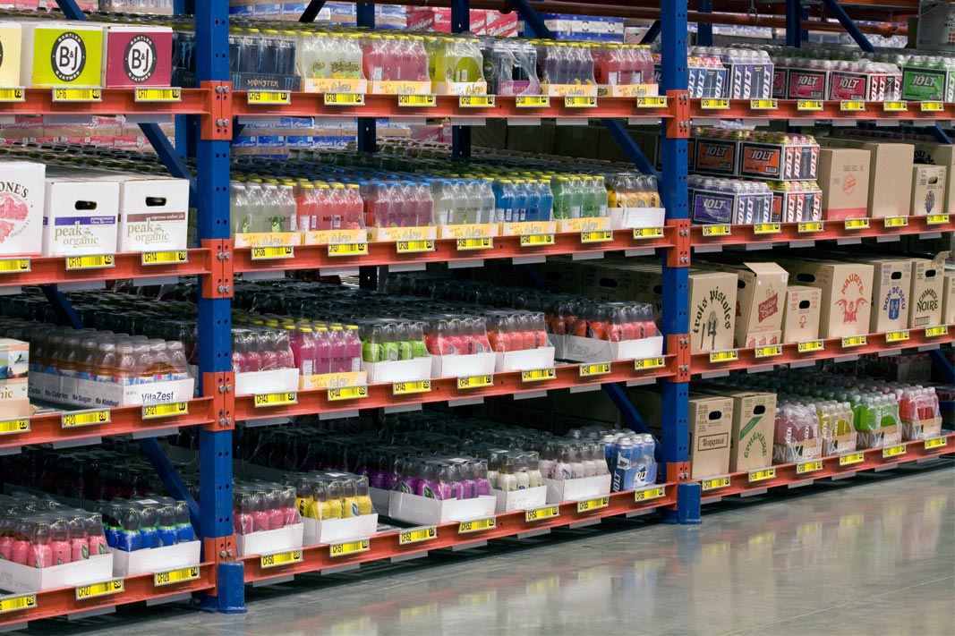 Case flow rack storing beverage products.