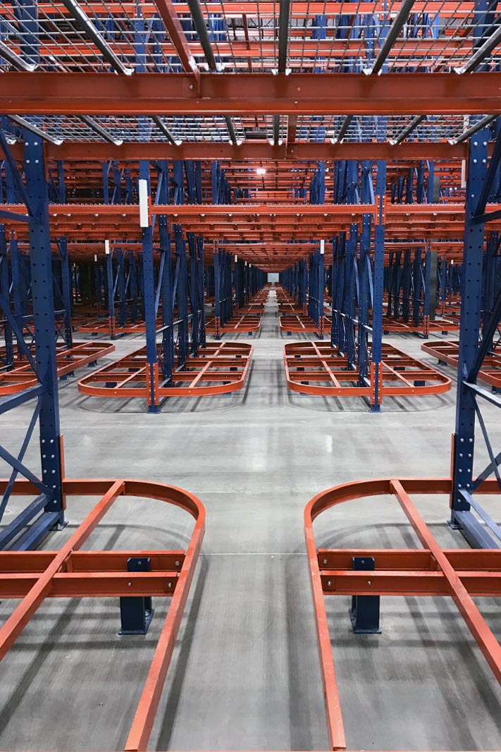 View of aisle to aisle walkthrough access via Ergo Deep® pallet rack.
