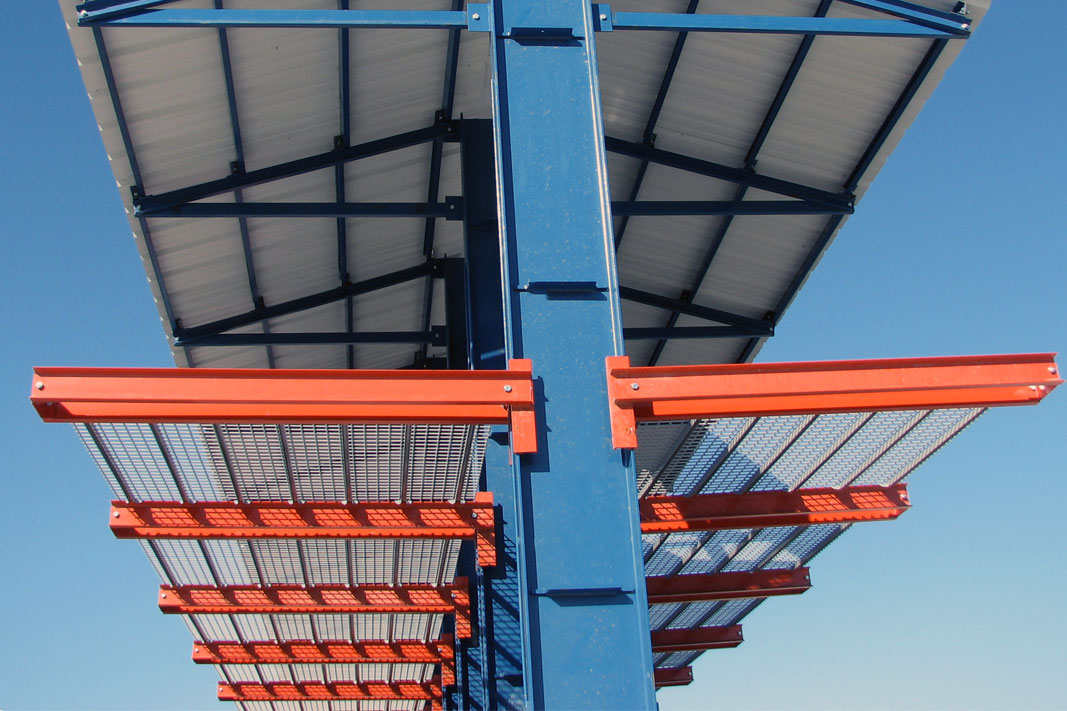 The infinitely adjustable arms of a Klampfast Cantilever® rack system.