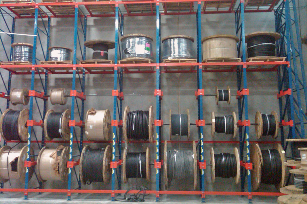 Reel Support Bracket accessory for pallet rack.